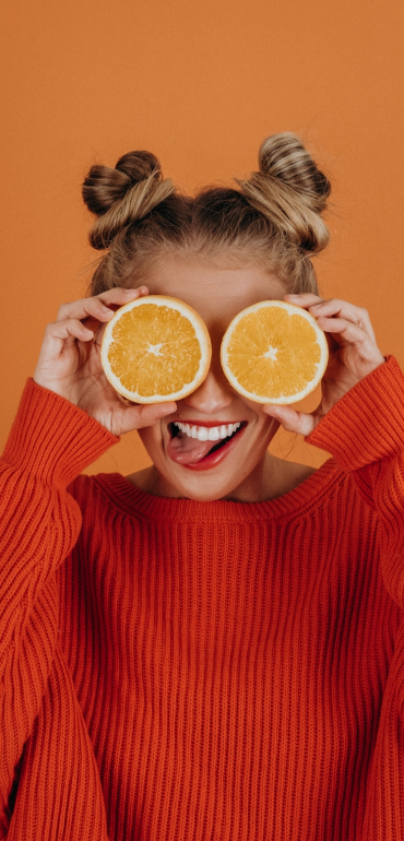Girl with some oranges